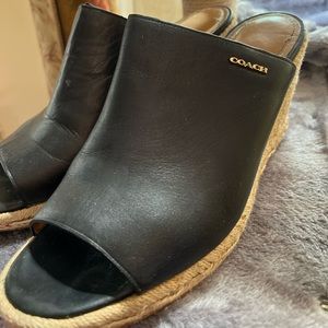 Gently used! Pre-owned Coach wedges will add class and flair to your closet!